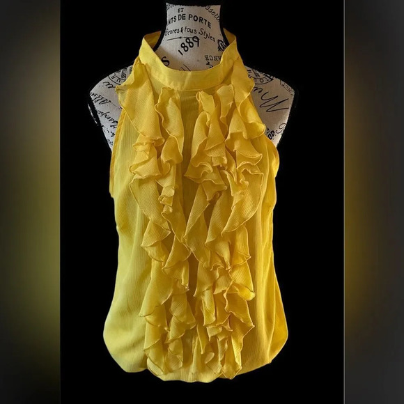 Xhilaration Tops - Xhileration chiffon yellow sleeveless blouse size large